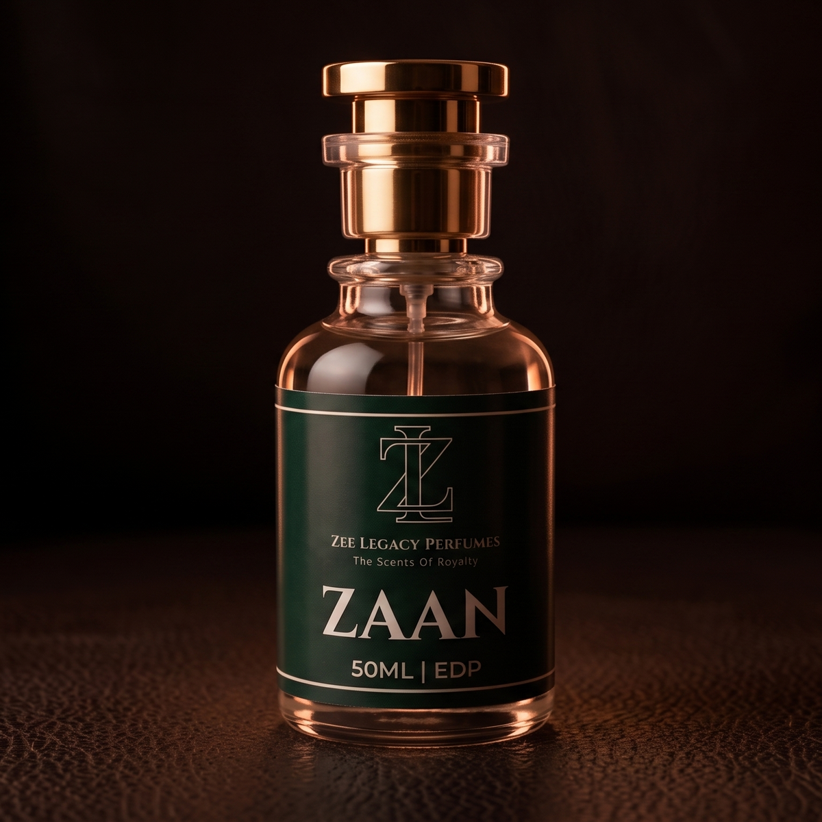 A 50ml bottle of Zaan Eau de Parfum by Zie Legacy Perfumes, featuring a dark green label and a metallic gold cap, set against a dark brown leather background.