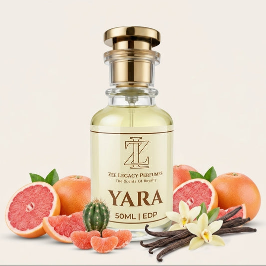 A 50ml bottle of YARA fragrance by Zee Legacy Perfumes, surrounded by grapefruit halves, a small cactus, vanilla beans, and white flowers on a light beige background.